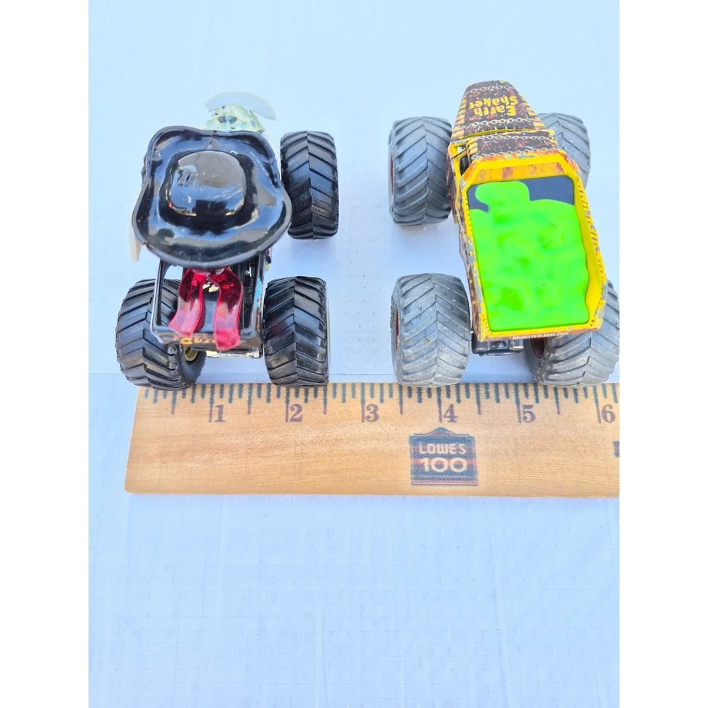 Monster Jam Pirates Curse and Zombie vs Hunter Earth Shaker Die-Cast Truck Lot
